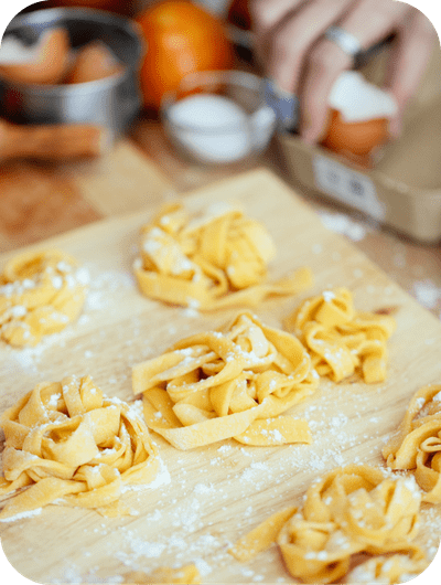 Handmade pasta dough being kneaded in a winery cooking class