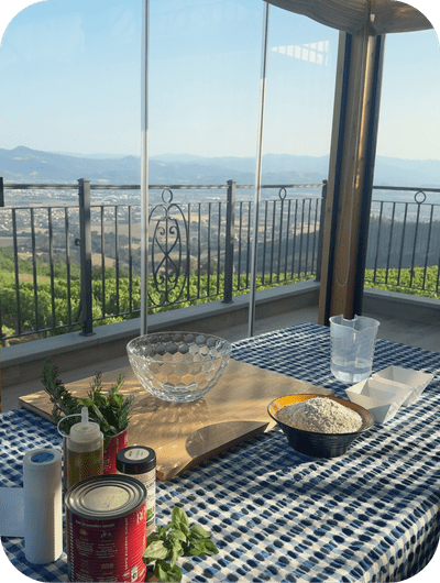 Preparing traditional pizza with local products in Umbria